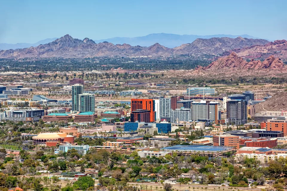 Aerial view of Tempe, Arizona with mountains in background